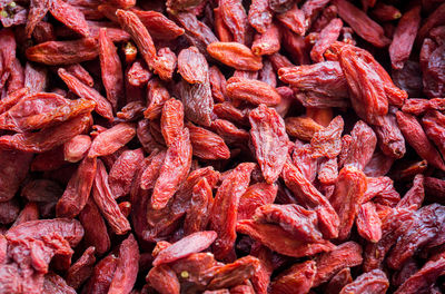 Full frame shot of red chili peppers for sale at market