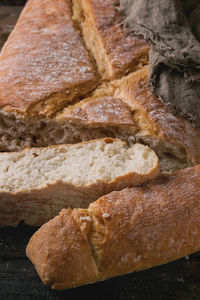 High angle view of bread on cutting board