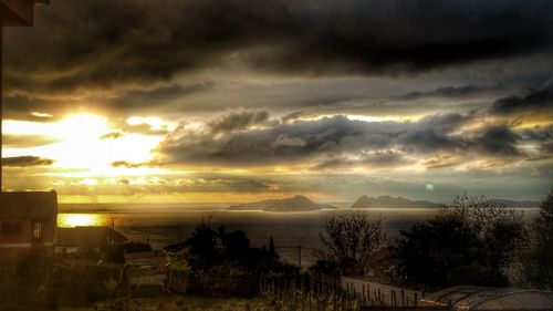 Scenic view of landscape against sky during sunset