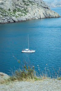 Sailboat sailing in sea