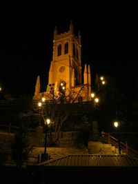 Low angle view of illuminated temple against sky at night