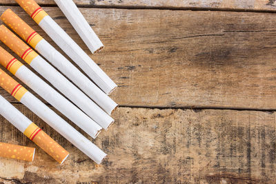 High angle view of paper on wooden table