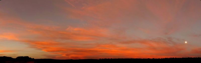 Scenic view of dramatic sky during sunset