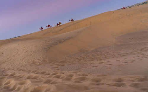 Scenic view of desert against clear sky