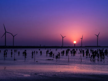 Scenic view of sea against clear sky during sunset