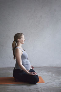 Pregnant woman doing yoga