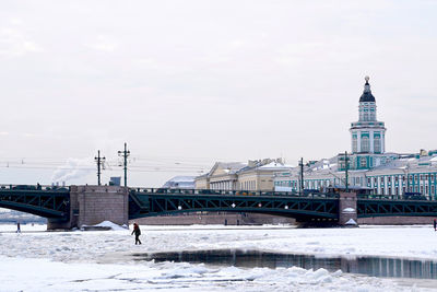 Buildings in city during winter