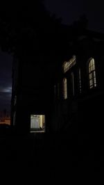 Low angle view of building against sky at night