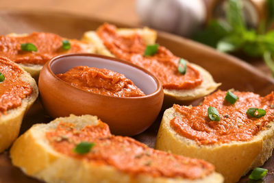 Close-up of pizza served on table