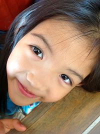 Close-up portrait of smiling girl