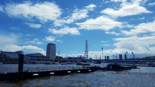 Boats moored at harbor