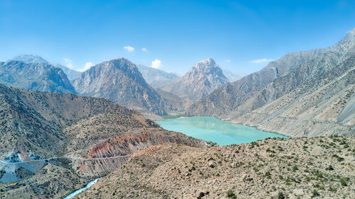 Scenic view of lake against blue sky