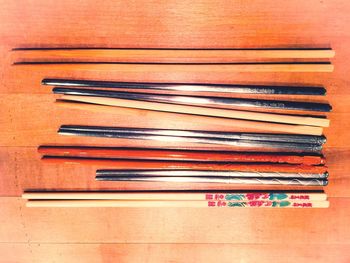 Close-up of colored pencils on white surface