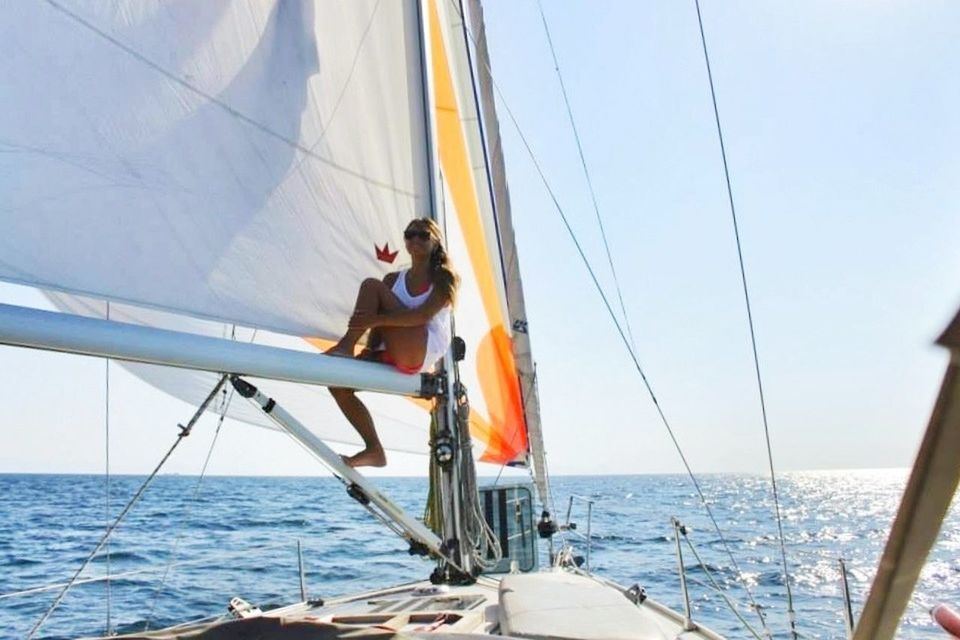 sea, nautical vessel, water, transportation, horizon over water, boat, mode of transport, sky, lifestyles, leisure activity, travel, sailboat, men, sailing, rope, vacations, sitting, mast