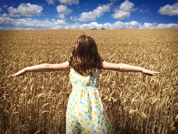 Woman standing on field