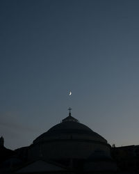 Low angle view of cathedral against clear sky at dusk