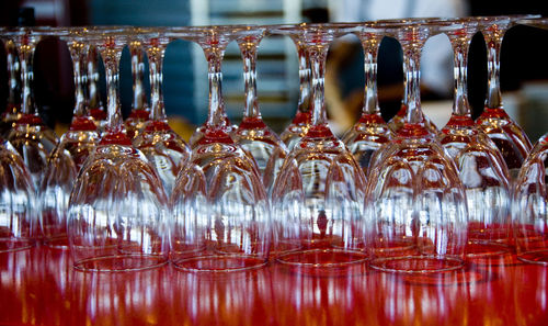 Close-up of wineglasses on table at bar