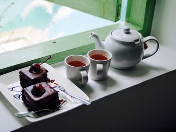 Close-up of tea cup on table