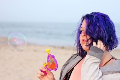 Young woman with bubbles