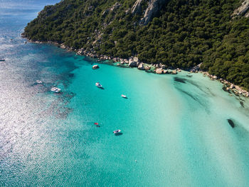 High angle view of boats on sea shore