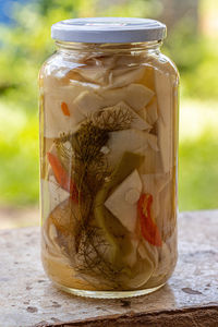 Close-up of food in jars on table