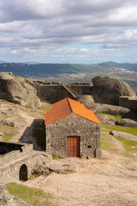 Monsanto historic castle with stone santa maria church and landscape view, in portugal