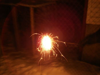 Close-up of illuminated firework display at night