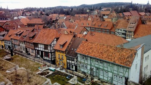 High angle view of residential buildings in city