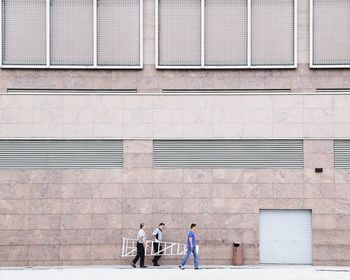 Man standing in front of building