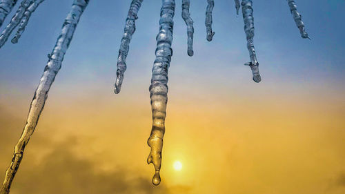 Scenic view of sunset sky during sunrise with frozen ice