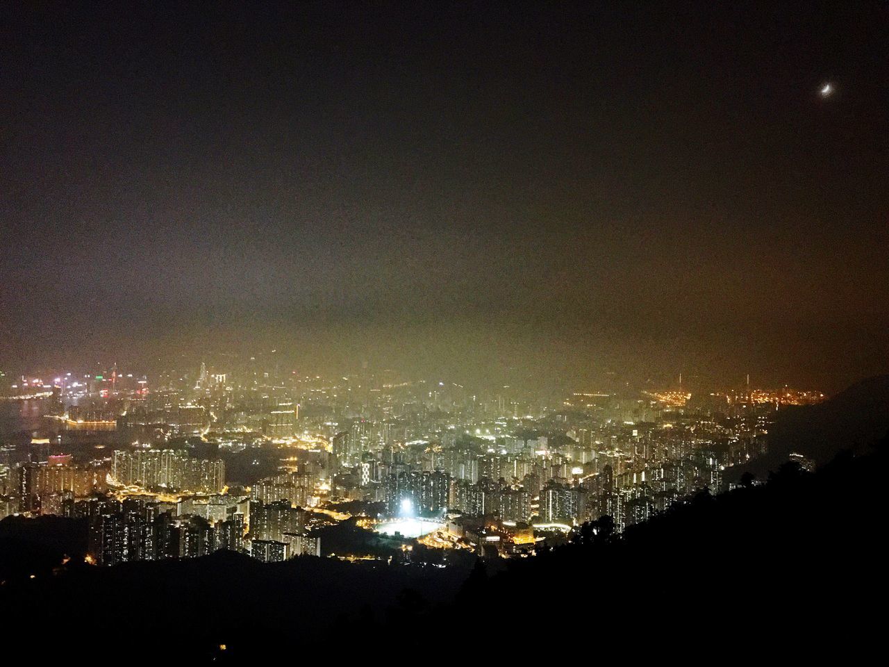 city, cityscape, illuminated, architecture, night, built structure, building exterior, crowded, sky, city life, clear sky, glowing, aerial view, wide, development, wide shot, capital cities, tall - high, wide angle, outdoors, no people, modern, skyscraper, residential district, financial district