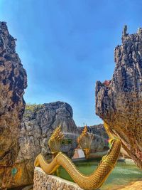 View of rock formations against sky