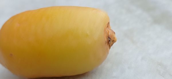 High angle view of yellow slices on table