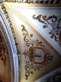 Low angle view of carving on ceiling at temple