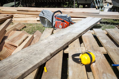 Close-up of equipment on wooden plank