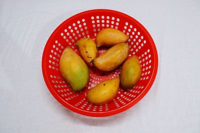 High angle view of fruits in bowl on table