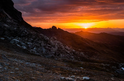 Scenic view of mountains against sky during sunset