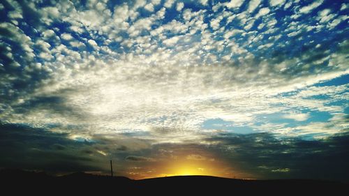 Scenic view of silhouette landscape against sky during sunset