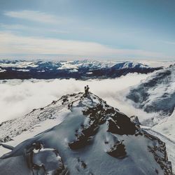 Scenic view of snow covered mountain against sky