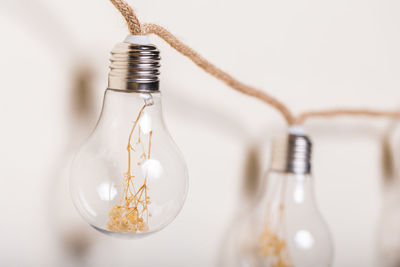 Close-up of illuminated light bulb