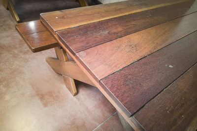 High angle view of empty bench on table