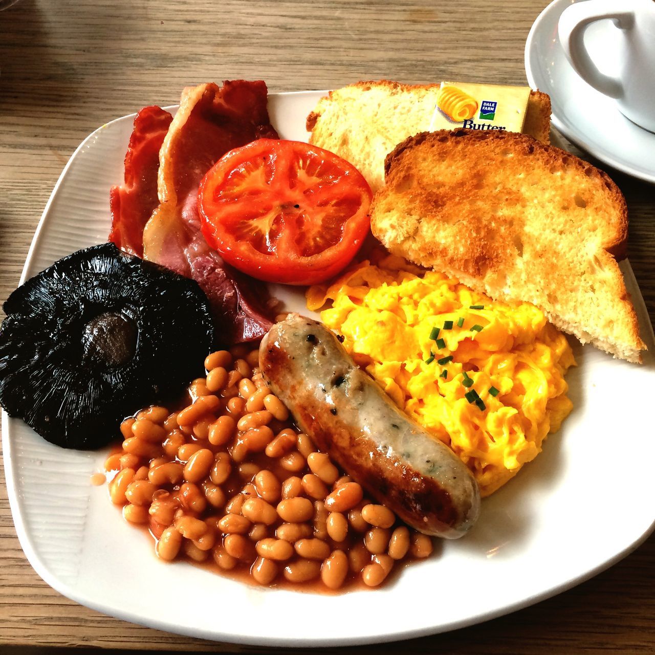 food and drink, food, freshness, plate, ready-to-eat, indoors, table, still life, healthy eating, serving size, close-up, high angle view, meal, breakfast, served, bread, slice, indulgence, meat, no people