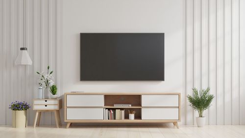 Television set on wall at home