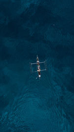 High angle view of man swimming in pool