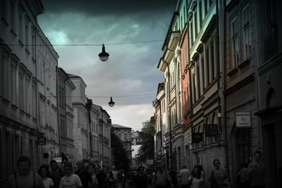 Crowd on street in city