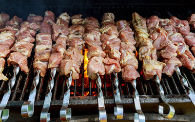 Close-up of meat on barbecue grill