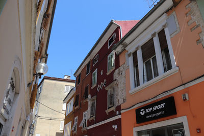 Low angle view of buildings against sky