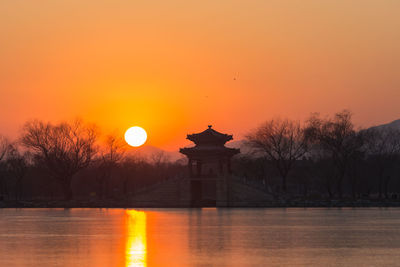 Scenic view of sunset over river