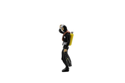 Man standing on rock against white background
