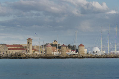 Windmills at mandraki harbour rhodes greece europe